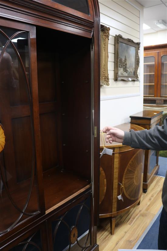 A George III style mahogany domed top bookcase W.112cm